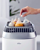 Bear bottle washer detergent tablet dissolving in baby bottle washer